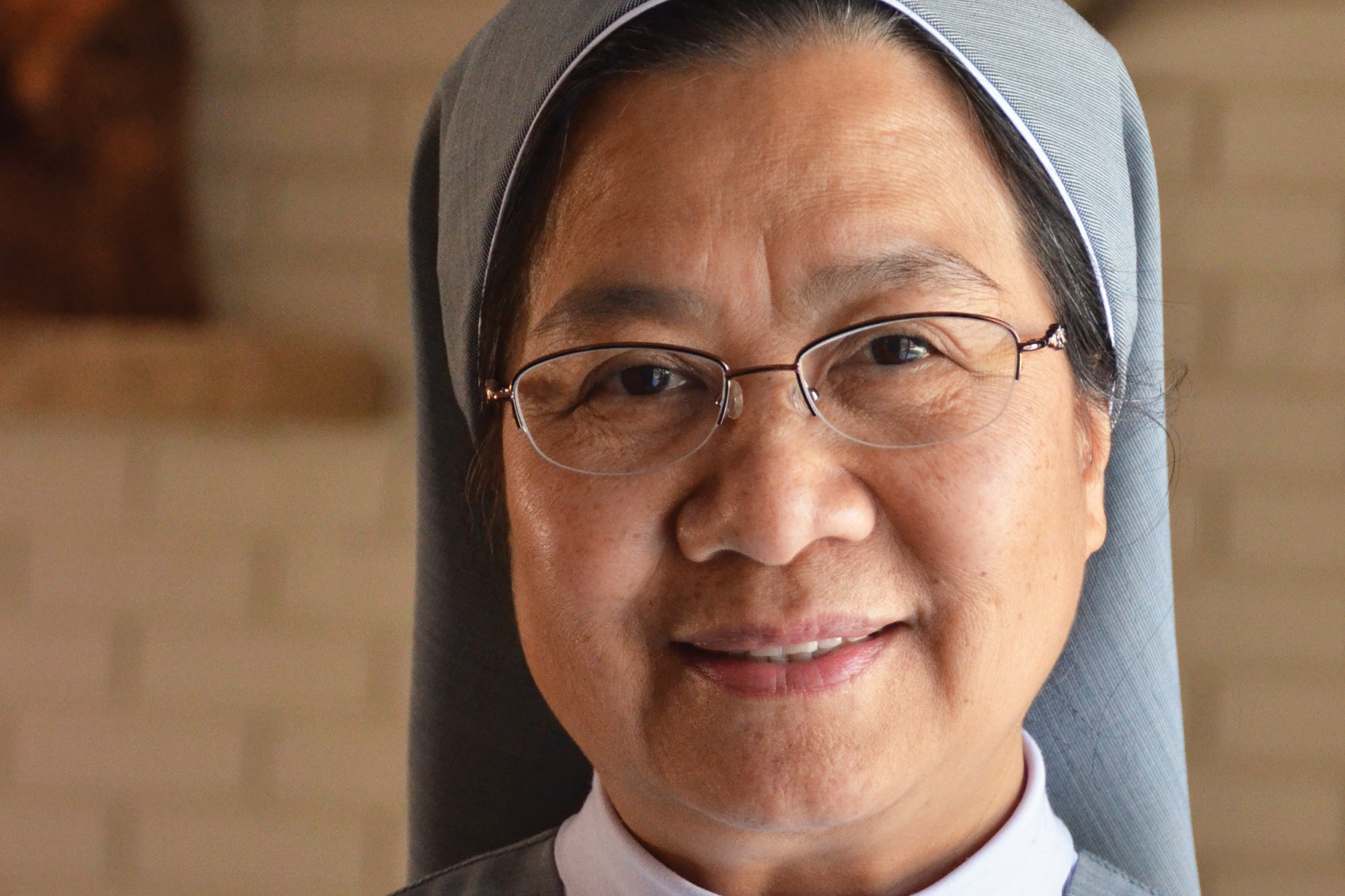 Sister Therese teaches kids to speak Vietnamese so they can talk to their parents