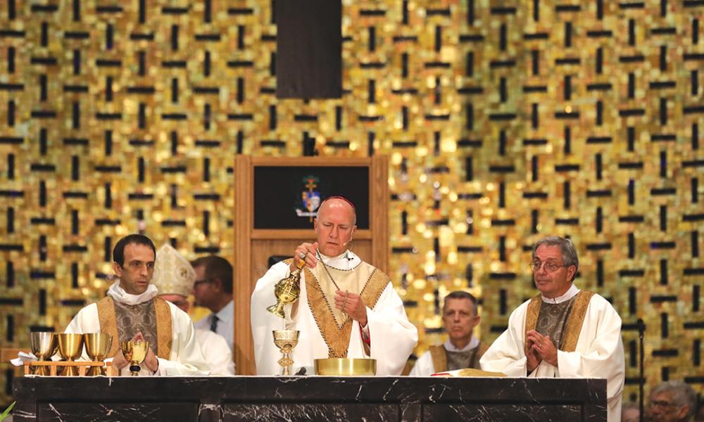 Bishop Vincke incenses the altar.