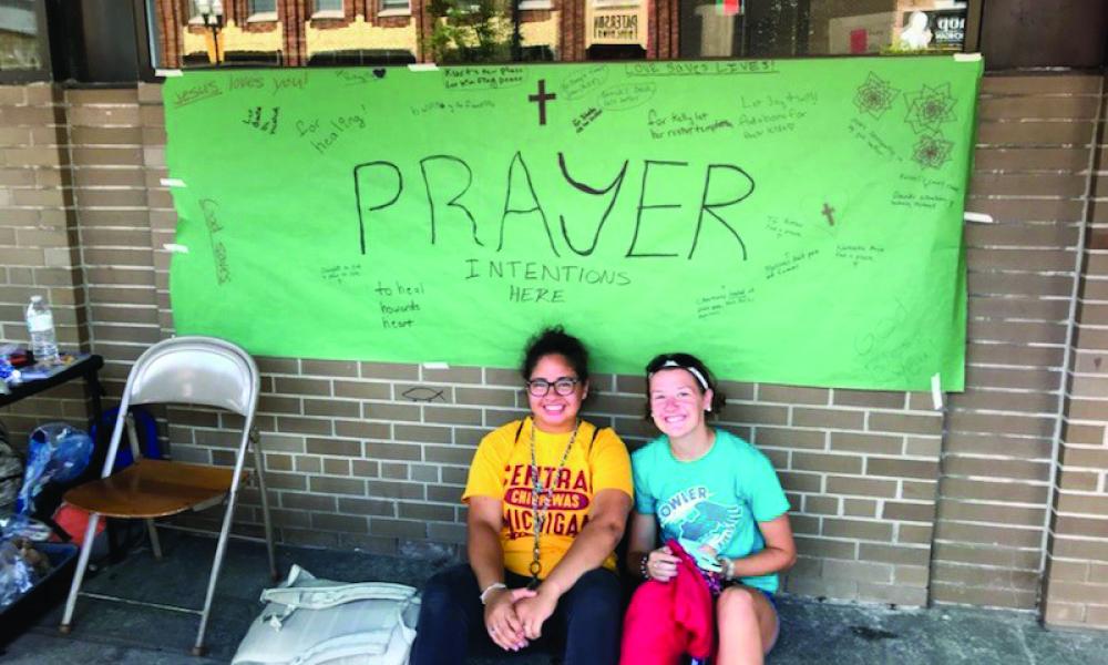 Students like Joshua participate in St. Paul Street Evangelization as part of the Flint Mission