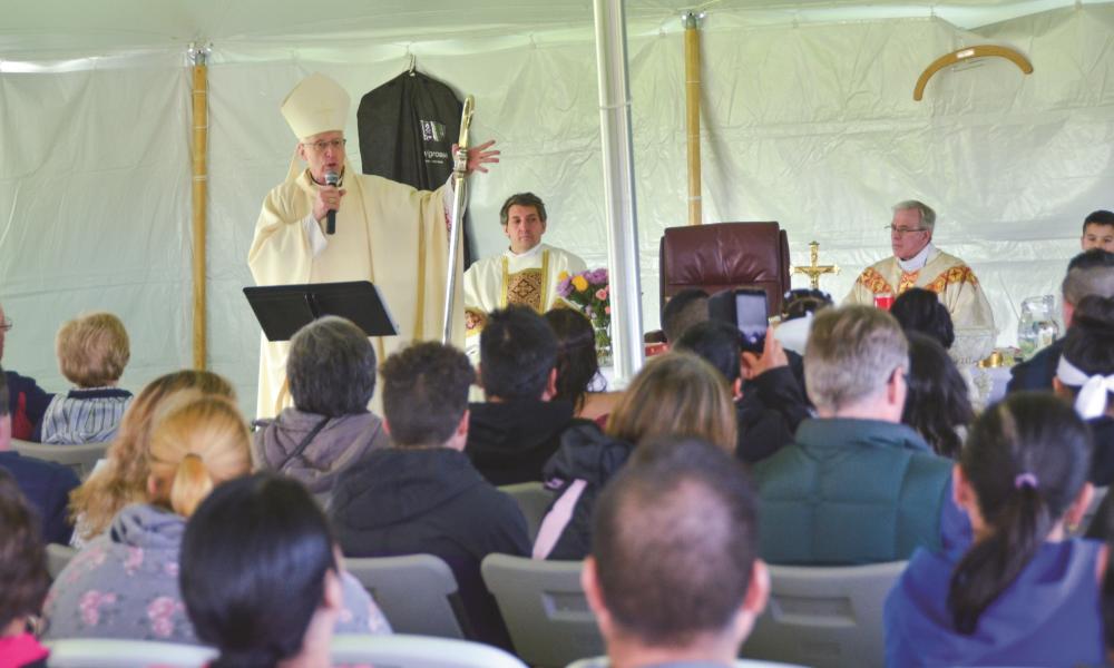Bishop Earl Boyea's Mass on opening day of the Clinton County soccer league