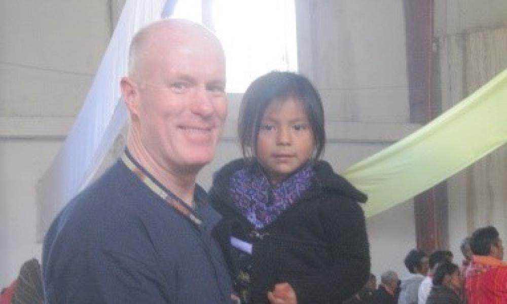 Craig with child in Santa Catarina Church, Ixtahuacan.