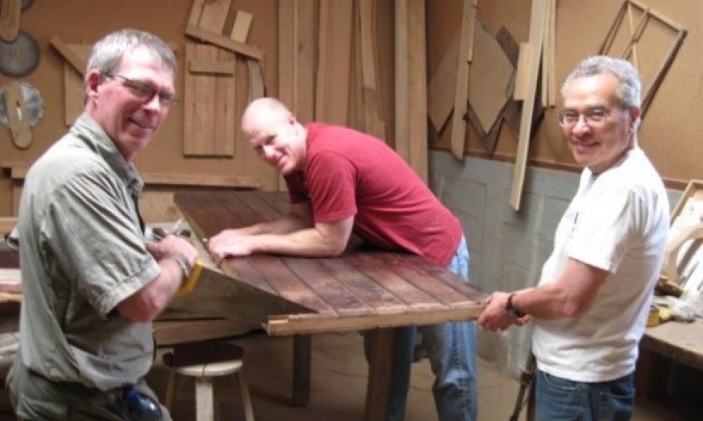 Pat, Craig, and Victor working on door for Marian Center.