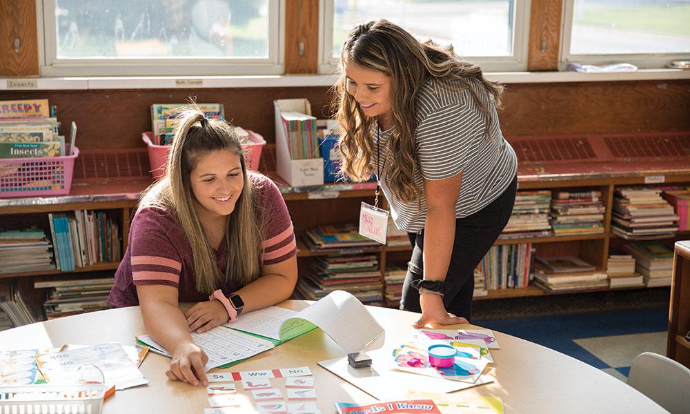 Nicole and Taylor Tutor at-risk Students