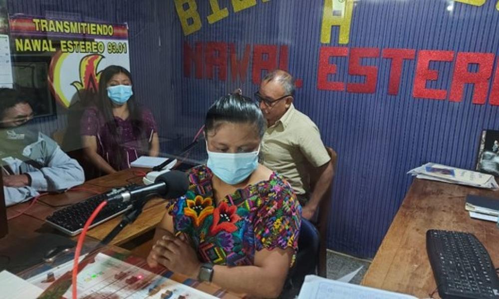 Radio staff broadcast from the radio station.