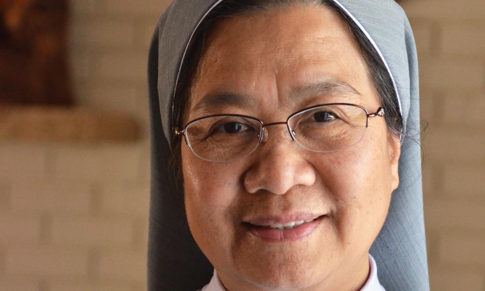 Sister Therese teaches kids to speak Vietnamese so they can talk to their parents