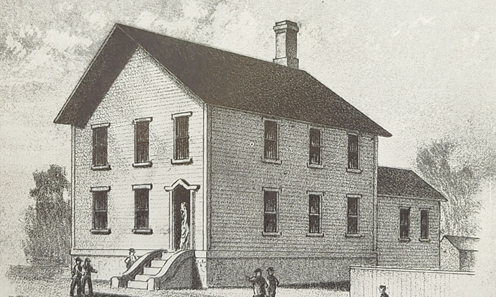 Illustration of an old two-story schoolhouse