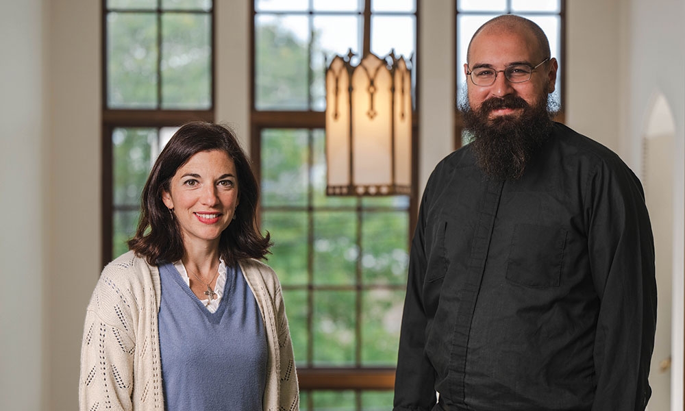 Dawn Hausmann, Diocese of Lansing’s di-rector of consecrated vocations, and Father Mike Cassar, diocesan director of vocations.