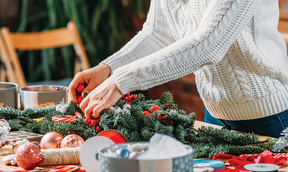 Woman setting holiday table