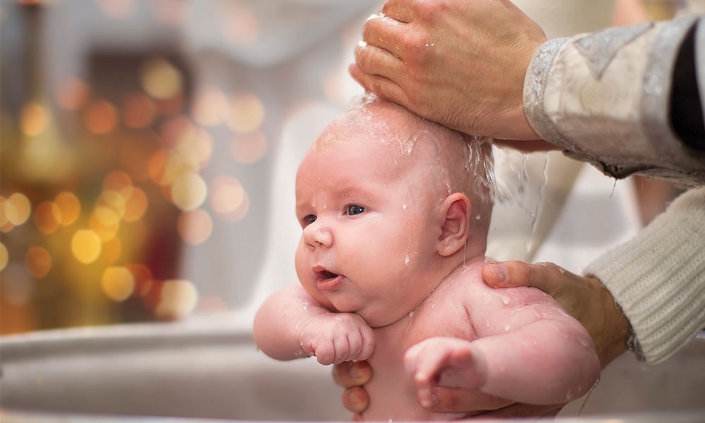 Baby being baptized