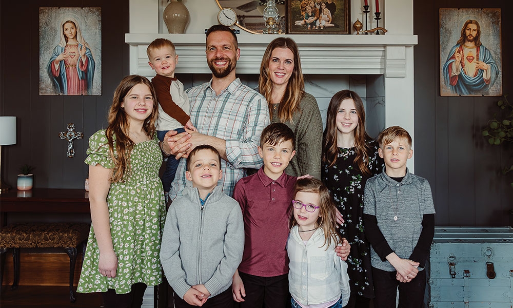 Taylor Feldpausch and his wife, Jessie, share family time with their children Giahna, 12, Avila, 11, Emmeric, 9, Elias, 8, Abram, 6, Kiara, 4, and Ezra, 1.