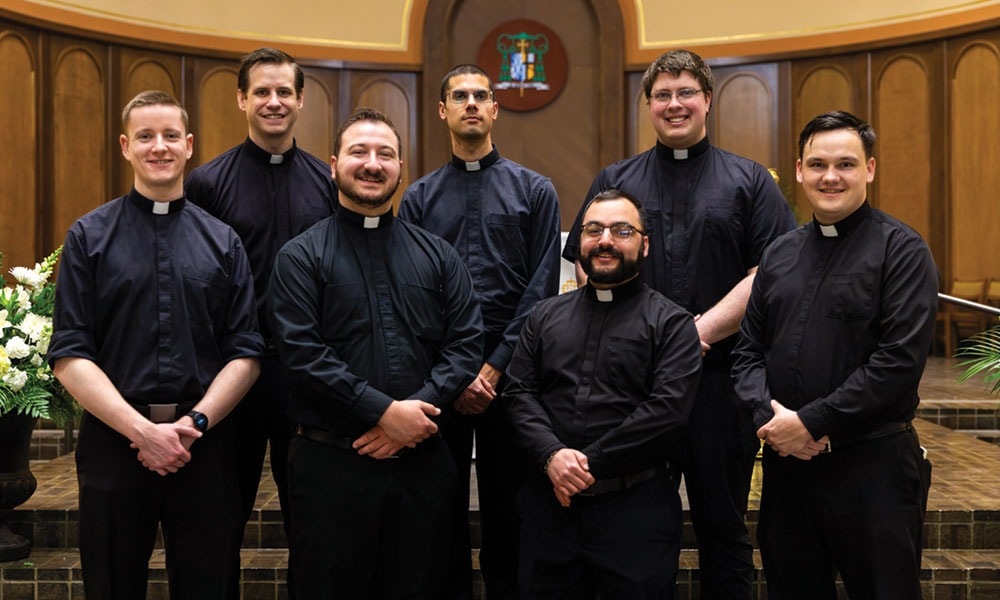 The newly ordained for the Diocese of Lansing