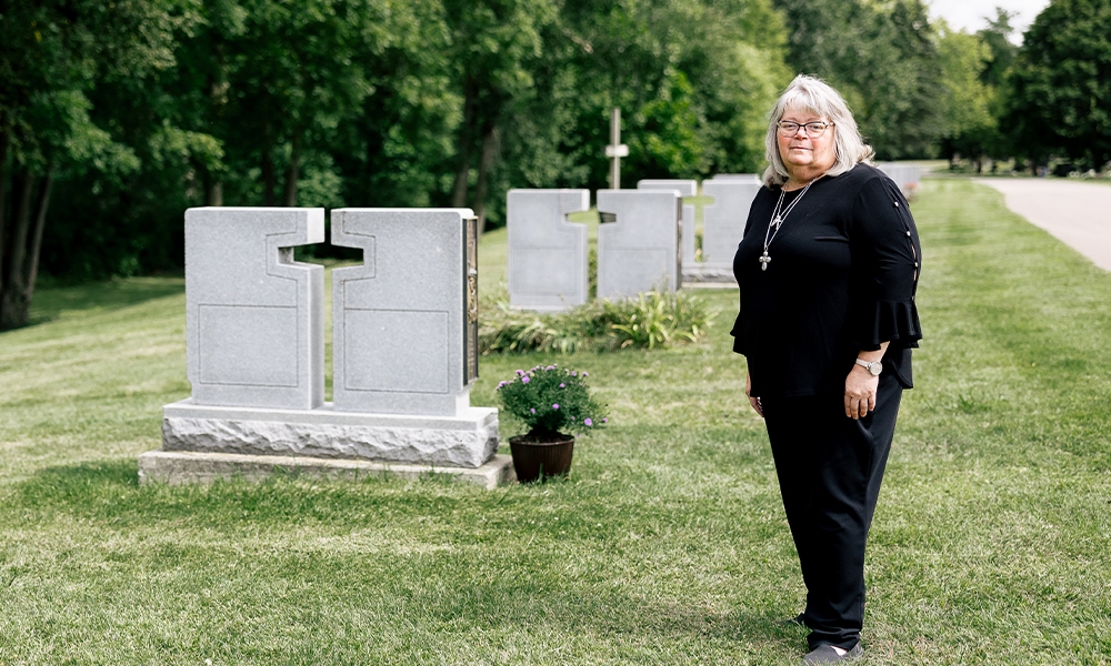 Joni Guenther pictured in a cemetery