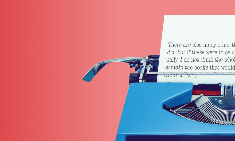 Image of a typewriter with a paper and a typed Bible passage from John 21:25