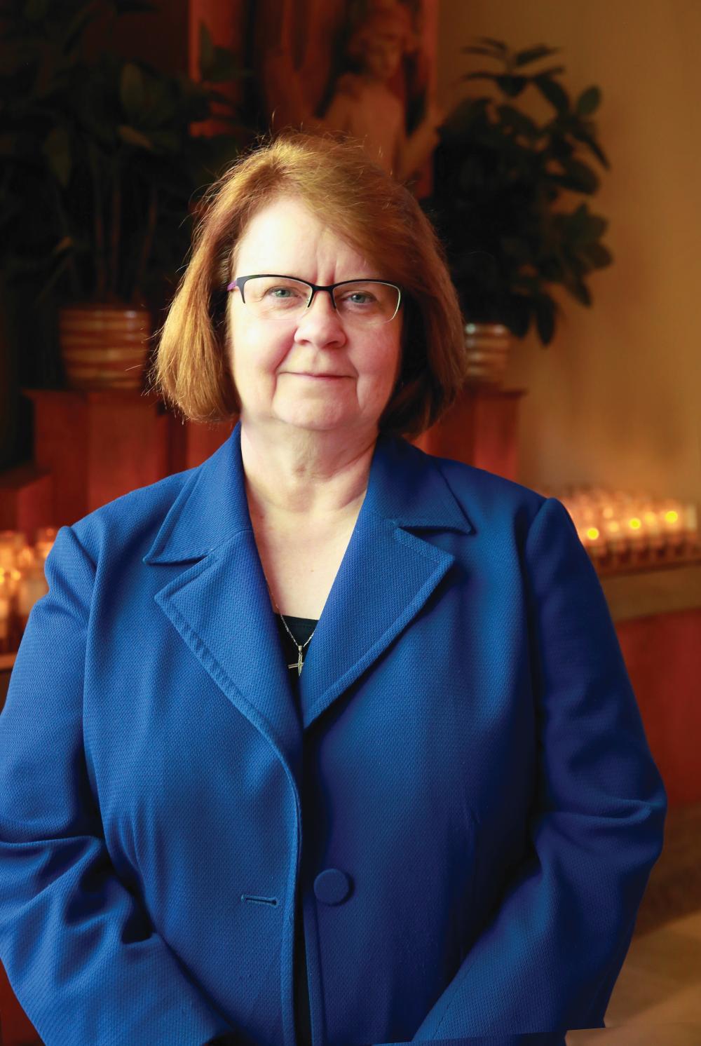 Donna's financial expertise helps keep diocese and parishes strong