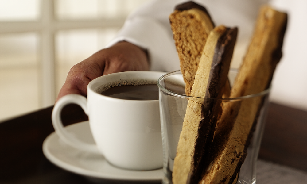 Biscotti and coffee on a tray