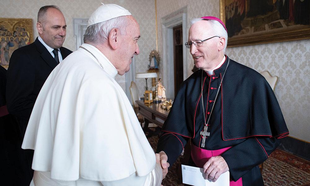 Bishop Boyea shaking Pope Francis' hand