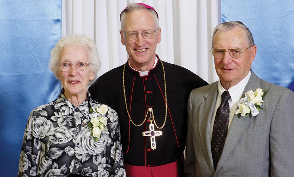 Bishop Early Boyea with his parents
